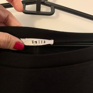 Black top with checkered sleeves